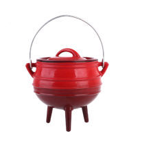 round cast iron enamel potjie pot with three-leggs for dish prepared outdoors